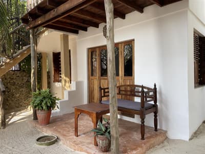 Nyeupe: Beachfront bungalow with 1 double bed and a bunk bed