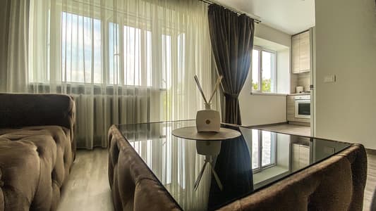 Apartamentai prie Malūno parko (Studija)