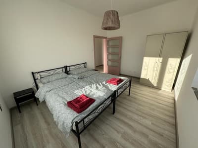 Twin room A with shared bathroom