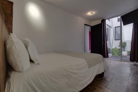 Punto E -  Suite de 2 habitaciones,  2 camas matrimoniales, planta baja. 4 personas