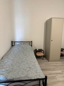 Twin room B with shared bathroom