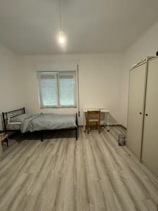 Twin room B with shared bathroom