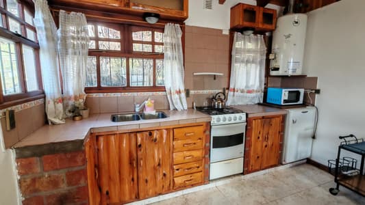 D20- Casa con alma de cabaña