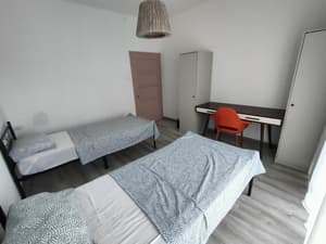 Twin room C with shared bathroom