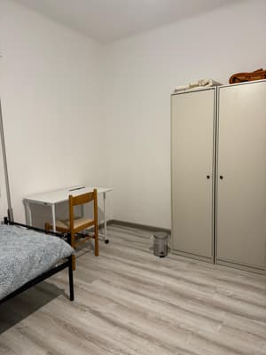 Twin room B with shared bathroom
