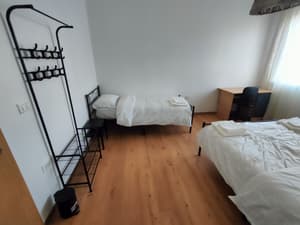 Triple room with shared bathroom