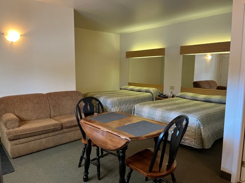 Two - Queen Beds with Couch ( No Pets allow )