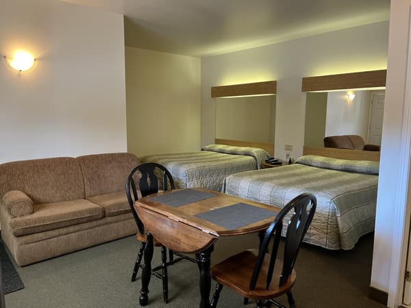 Two - Queen Beds with Couch ( No Pets allow )