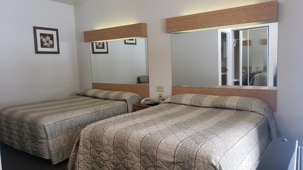 Two - Queen Beds ( No Pets allow )