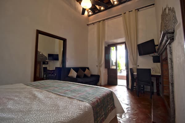 Punto 1 - Cama King Size, planta baja.