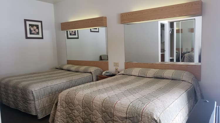 Two - Queen Beds ( No Pets allow )