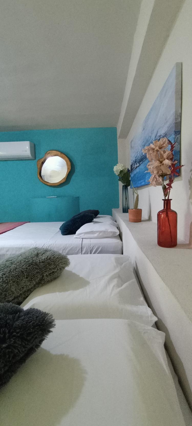 Delfín · Habitación privada con baño, cerca playa la punta Brisas de Zicatela