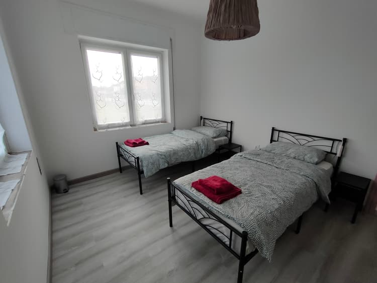 Twin room A with shared bathroom