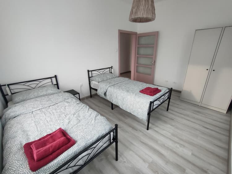 Twin room A with shared bathroom