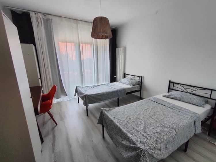 Twin room C with shared bathroom