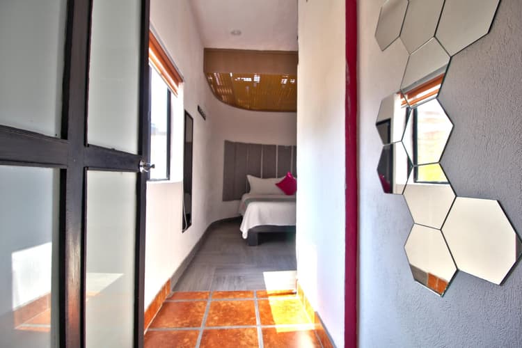 Punto 6 - Cama King Size, planta alta.