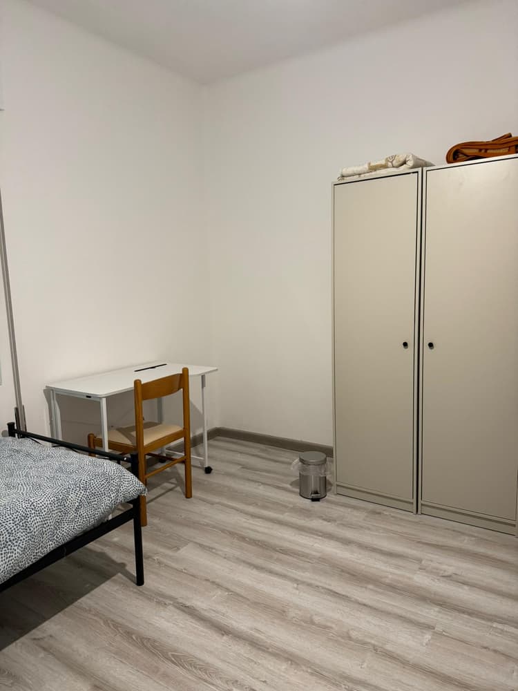 Twin room B with shared bathroom