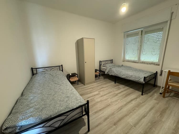 Twin room B with shared bathroom