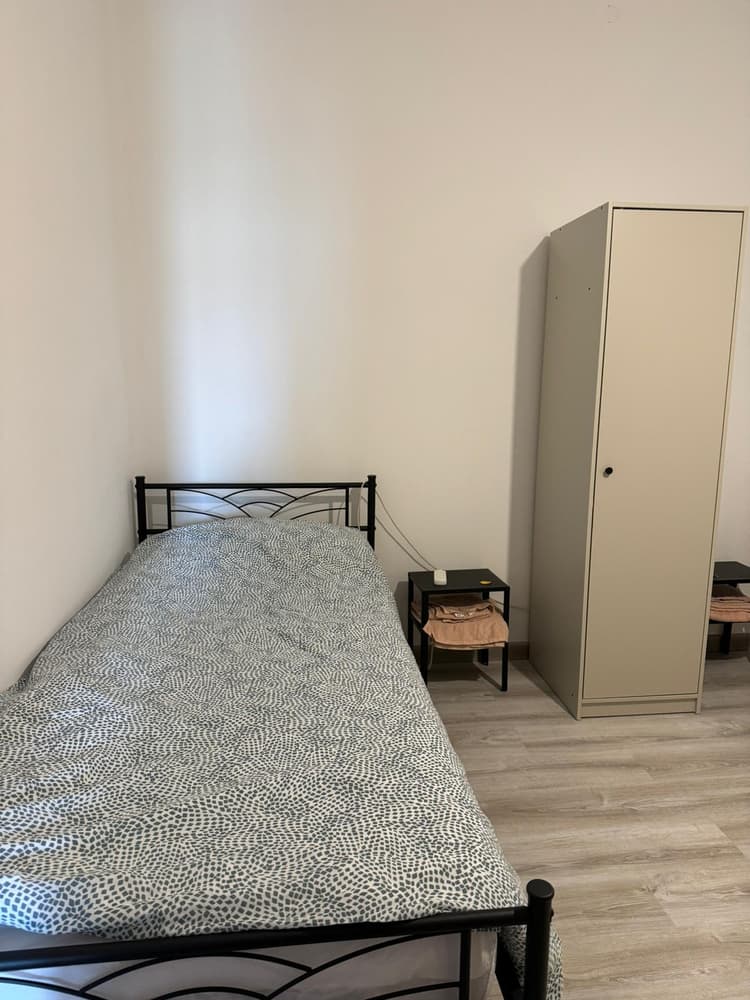 Twin room B with shared bathroom