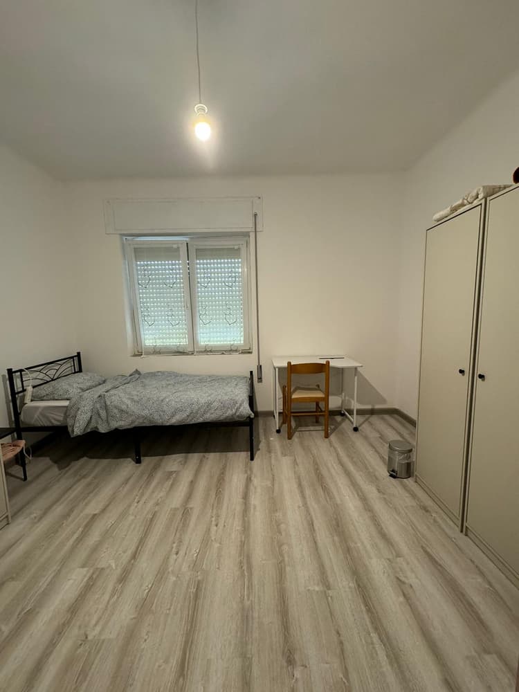 Twin room B with shared bathroom