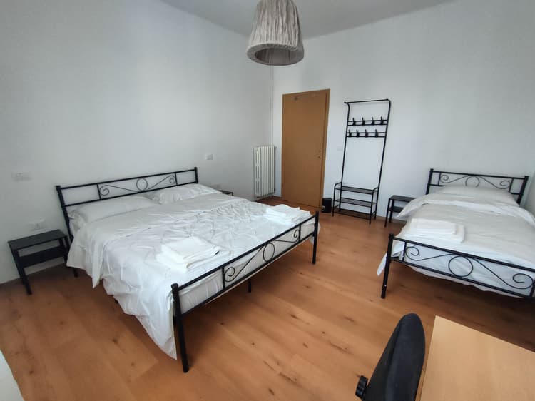 Triple room with shared bathroom
