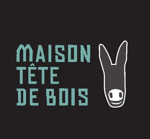 maison tête de bois