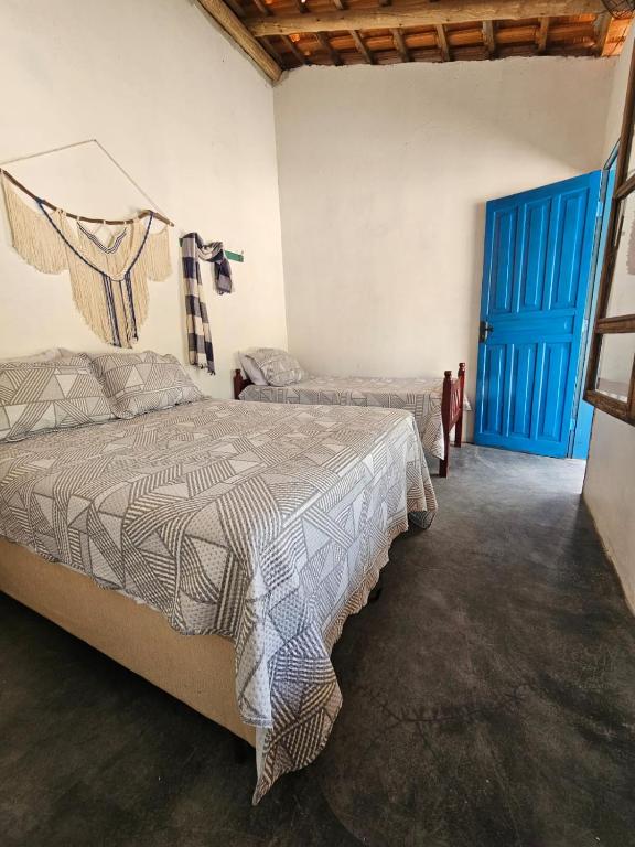 Quarto Triplo com Banheiro Privativo