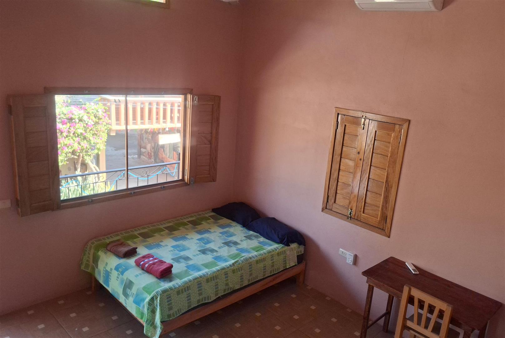 Doble con Aire Acondicionado